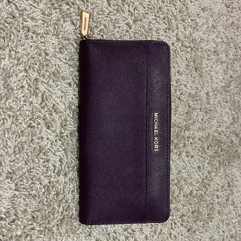 Michael Kors Plum Leather Mercer Zip Around Wallet. It is NEW!